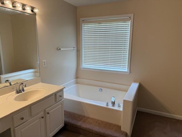4168 Glenaire Way Northwest Acworth, GA 30101 - Photo 11 of 19 a bathroom with a bathtub and a sink
