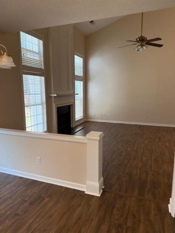 4168 Glenaire Way Northwest Acworth, GA 30101 - Photo 17 of 19 an empty room with wooden floor fan and windows