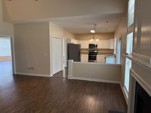 4168 Glenaire Way Northwest Acworth, GA 30101 - Photo 3 of 19 a view of a kitchen with wooden floor and electronic appliances