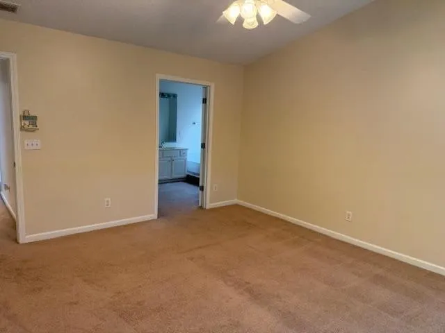 an empty room with a bathroom