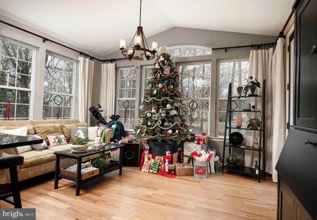 a view of a livingroom with entryway and hallway