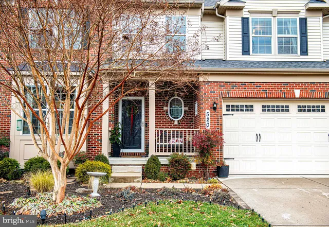 a front view of a building with garden