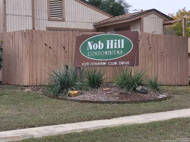 a sign on the side of a building