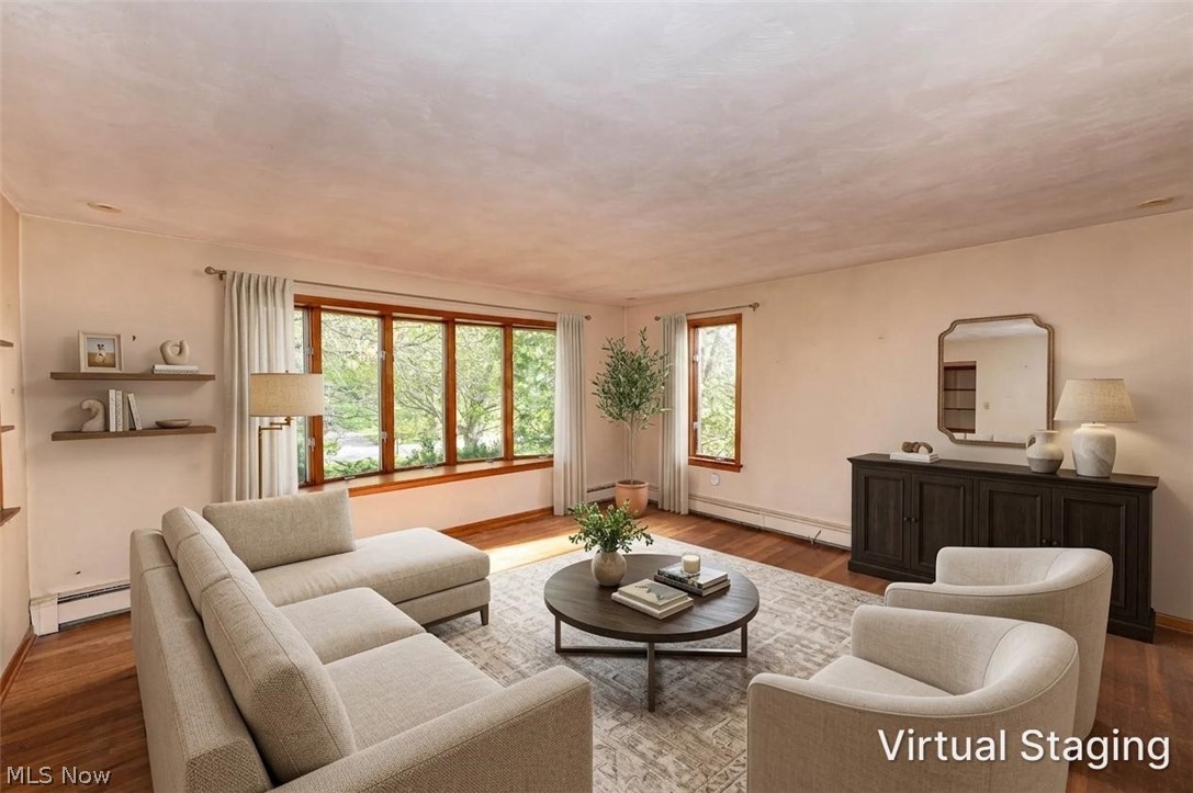 12310 Huntoon Road Painesville, OH 44077 - Photo 2 of 48 Spacious open living room with large bow window and abundant natural lighting