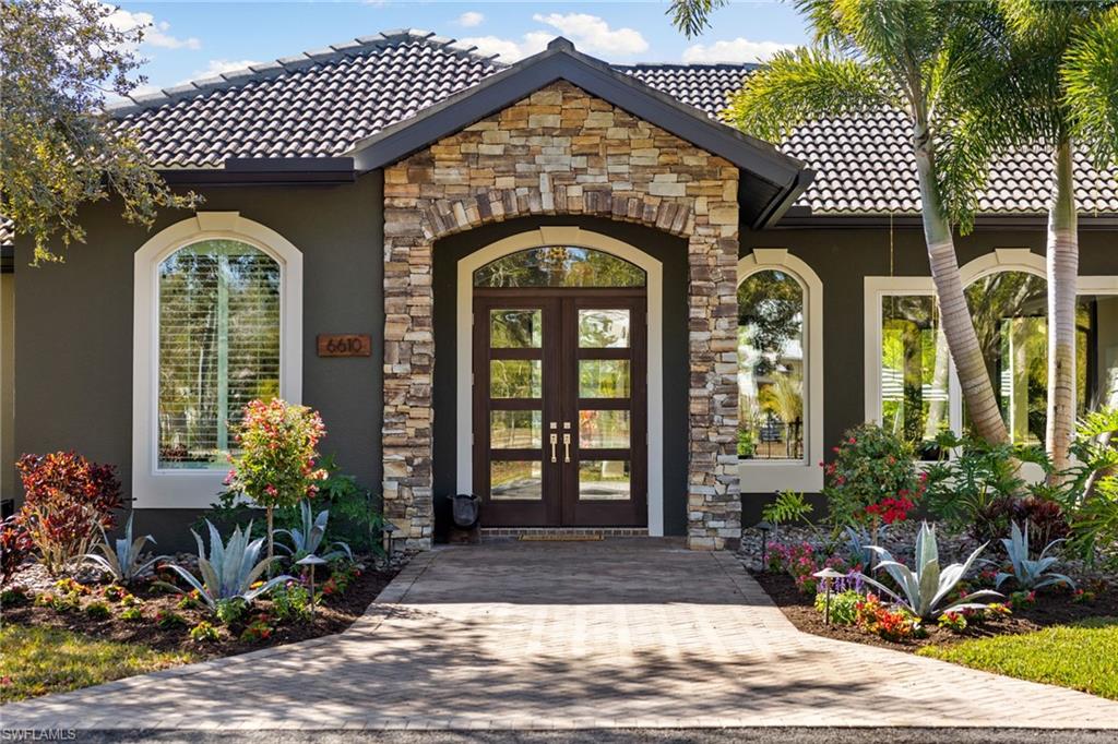 6610 Sable Ridge Lane Naples, FL 34109 - Photo 47 of 47 a view of a entryway door of the house