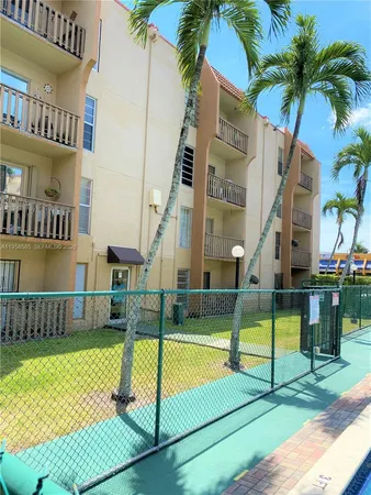 a view of pool with yard