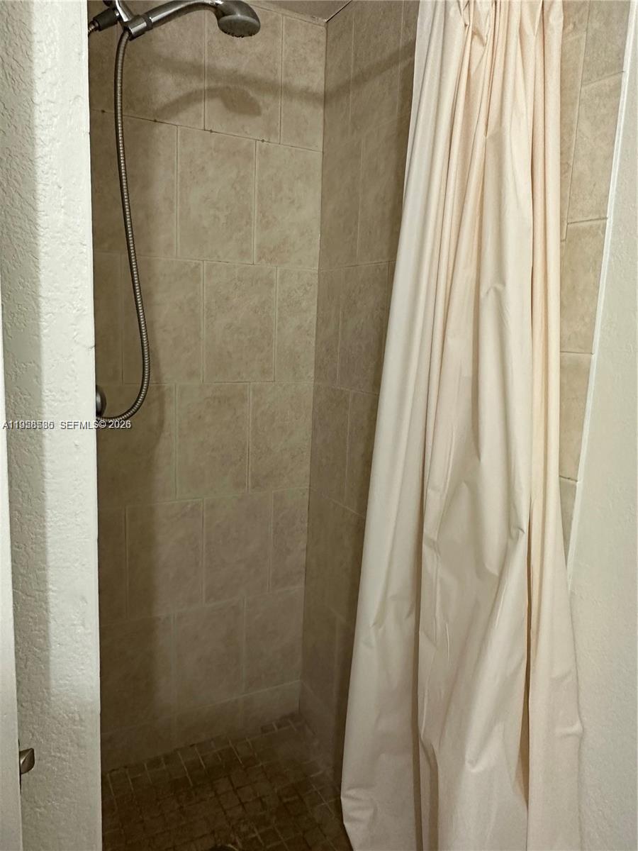 4715 Northwest 7th Street, Unit 3022 Miami, FL 33126 - Photo 8 of 19 2nd bedroom Bathroom