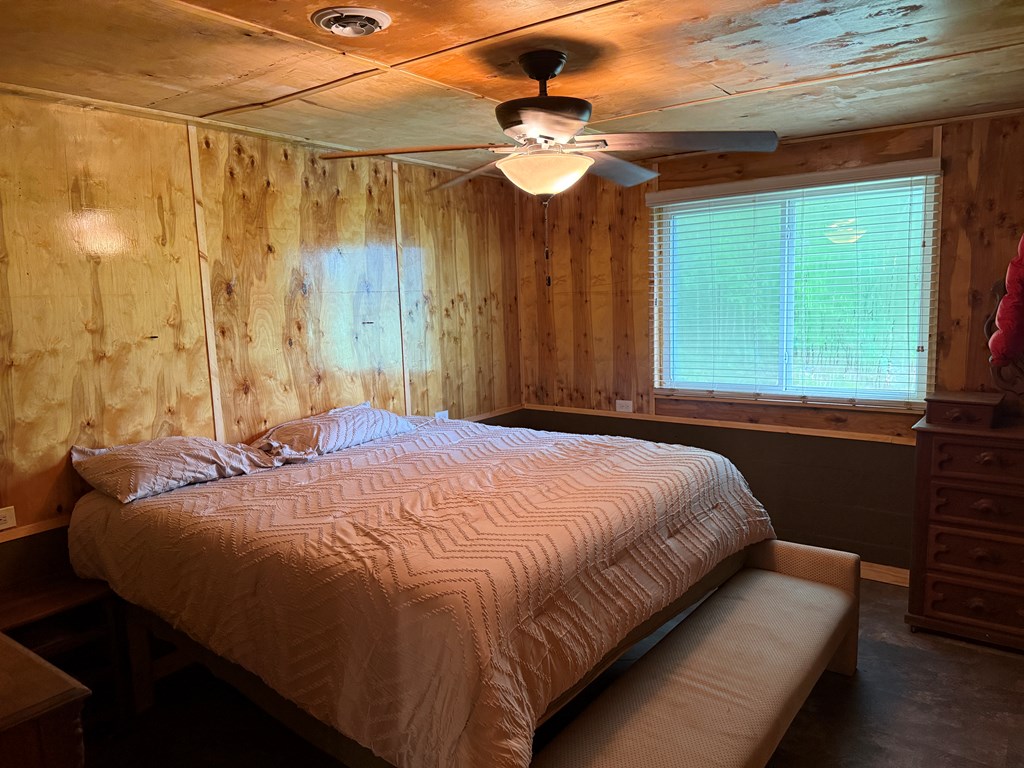 37 Shady Crk Ridge Marble, NC 28905 - Photo 17 of 28 a bed sitting in a bedroom next to a window