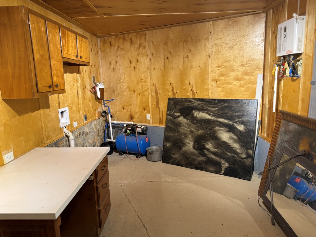 37 Shady Crk Ridge Marble, NC 28905 - Photo 26 of 28 a bedroom with a bed and a flat tv screen