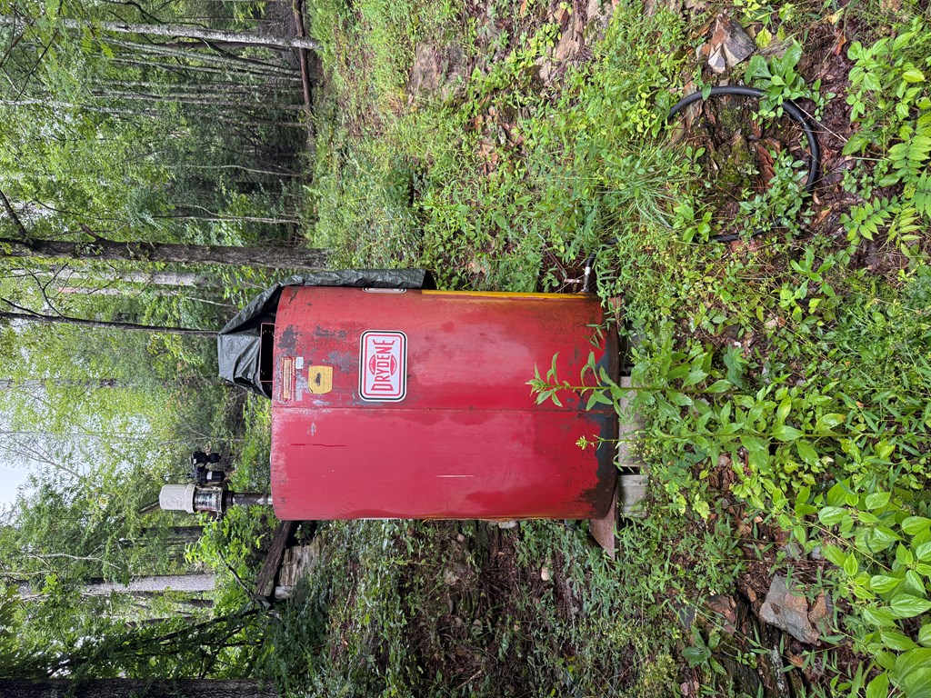 37 Shady Crk Ridge Marble, NC 28905 - Photo 28 of 28 a view of a red and white house with a yard
