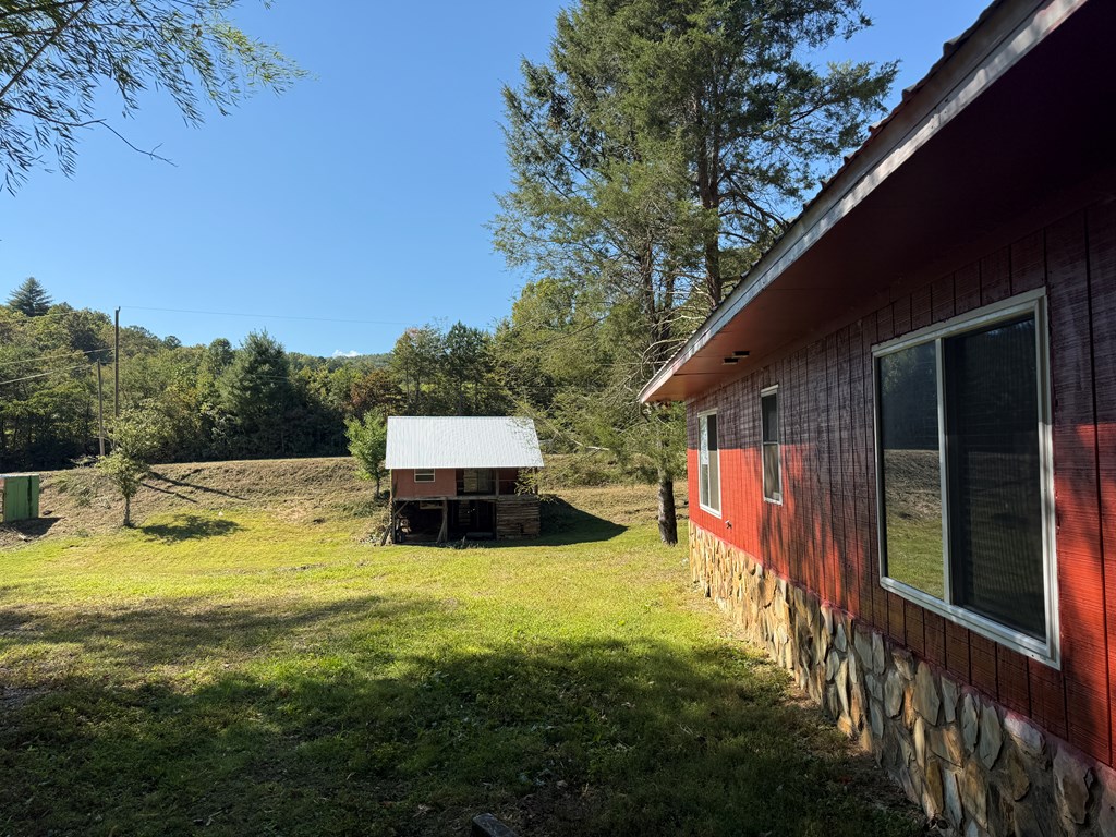 37 Shady Crk Ridge Marble, NC 28905 - Photo 6 of 28 a view of a house with swimming pool and sitting area