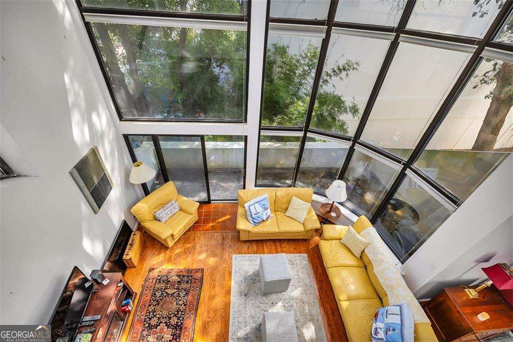 548 Oglethorpe Avenue, Unit 11 St. Simons, GA 31522 - Photo 13 of 25 a view of an outdoor space with seating area