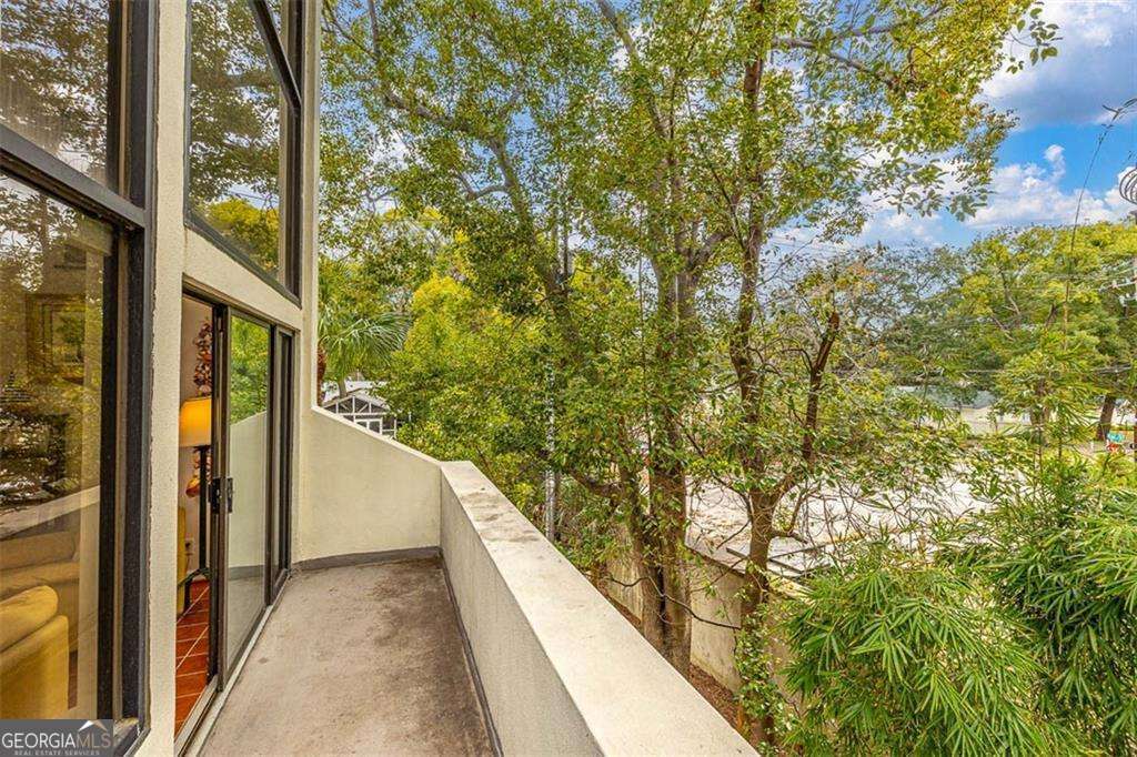 548 Oglethorpe Avenue, Unit 11 St. Simons, GA 31522 - Photo 19 of 25 a view of balcony