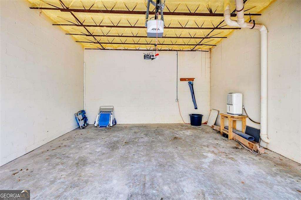548 Oglethorpe Avenue, Unit 11 St. Simons, GA 31522 - Photo 25 of 25 a view of a room with utility room