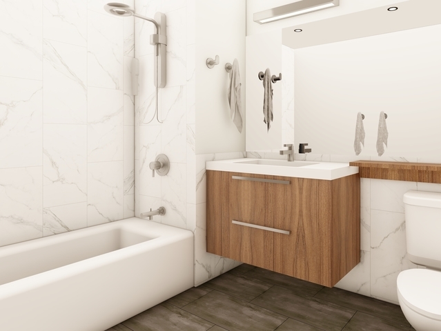 5691 North Ridge Avenue, Unit 302 Chicago, IL 60660 - Photo 9 of 12 a bathroom with a sink a toilet and shower