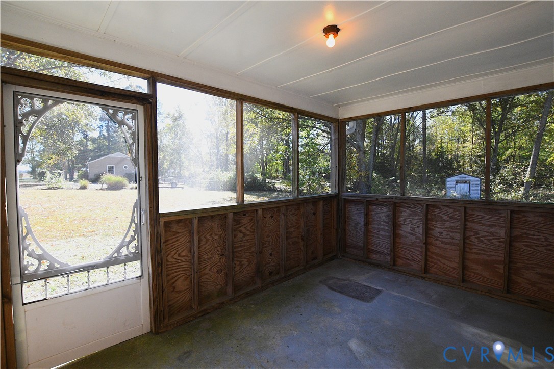 8071 Dabneys Mill Road Manquin, VA 23106 - Photo 19 of 25 a view of an empty room with a large window