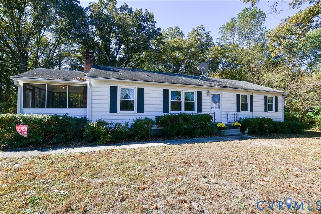 8071 Dabneys Mill Road Manquin, VA 23106 - Photo 2 of 25 a front view of a house with garden