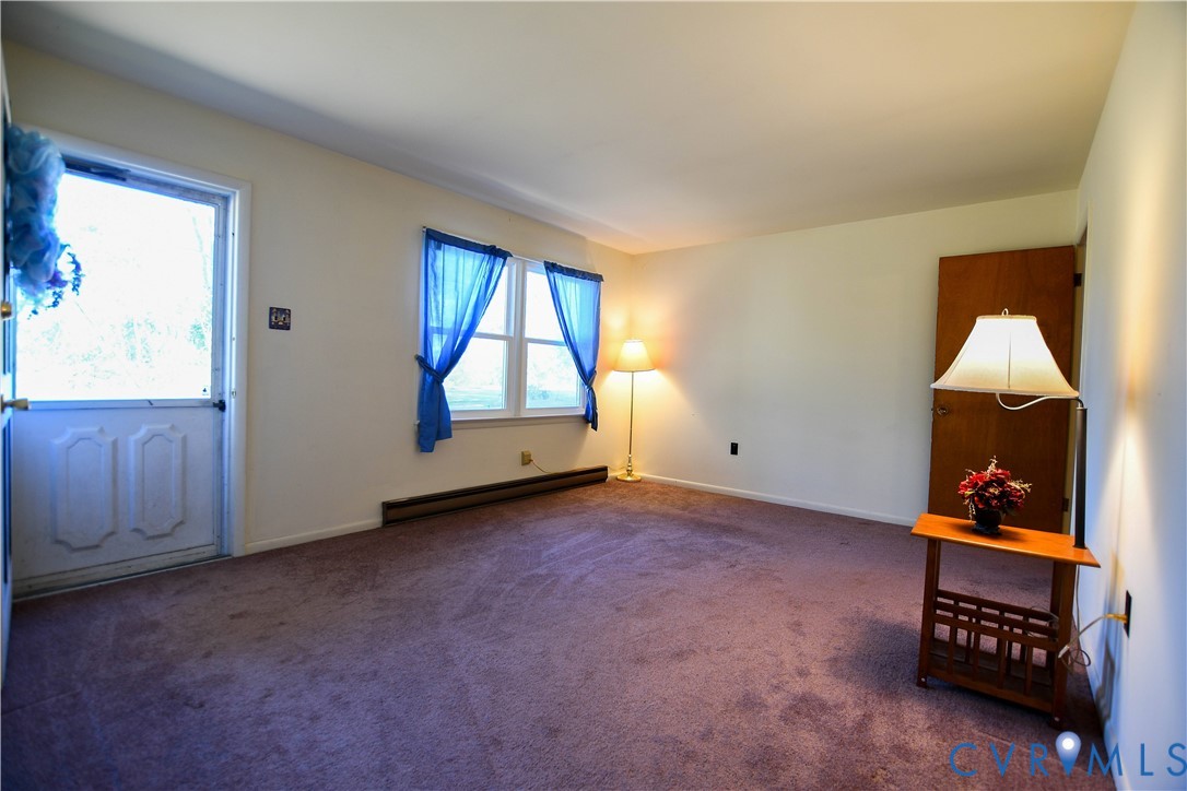 8071 Dabneys Mill Road Manquin, VA 23106 - Photo 3 of 25 an empty room with windows