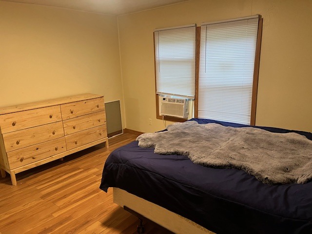 38455 North Sheridan Road, Unit 732 Beach Park, IL 60087 - Photo 14 of 25 a bedroom with a bed and a dresser