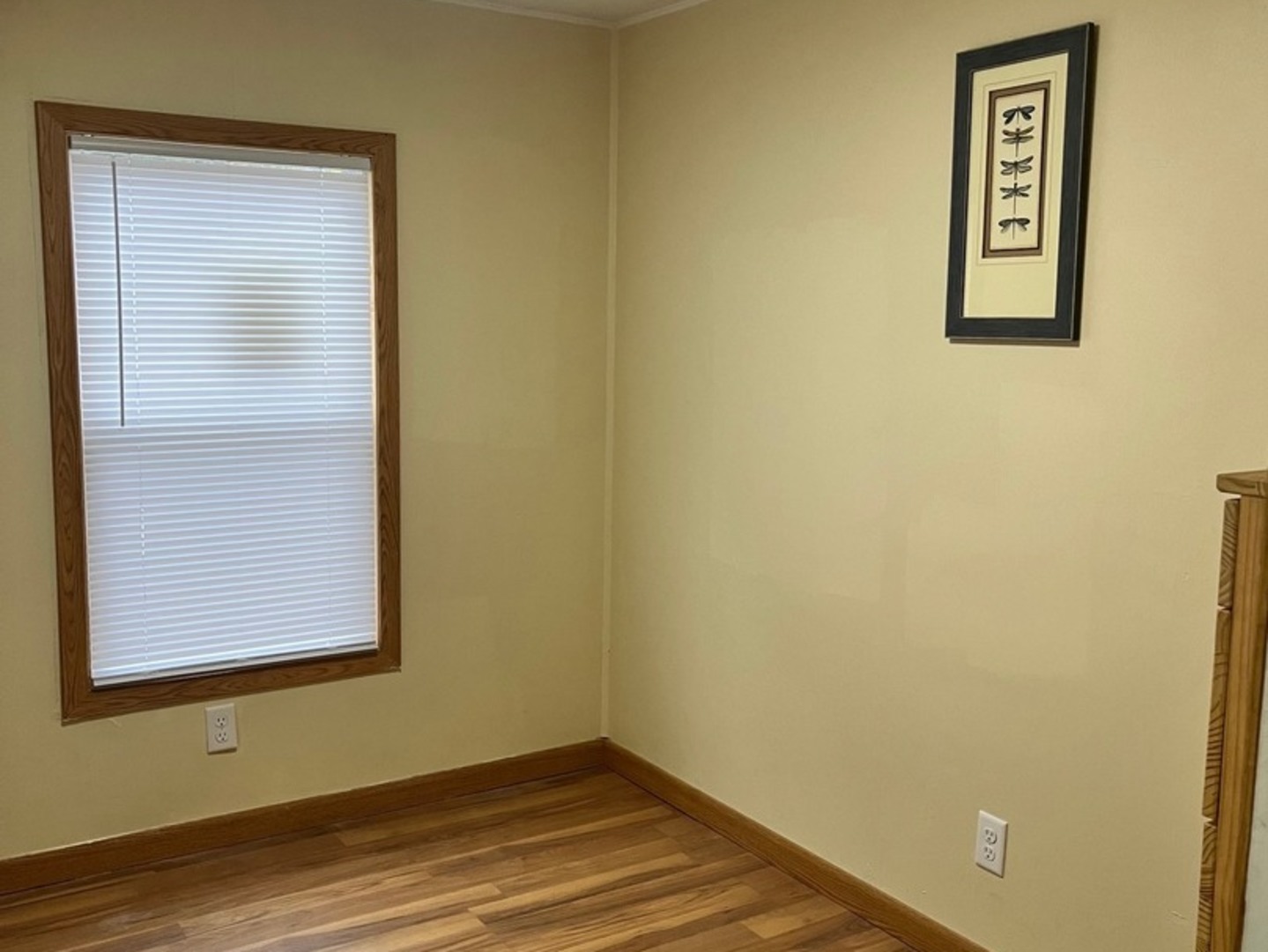 38455 North Sheridan Road, Unit 732 Beach Park, IL 60087 - Photo 17 of 25 a view of a small space with wooden floor and a window