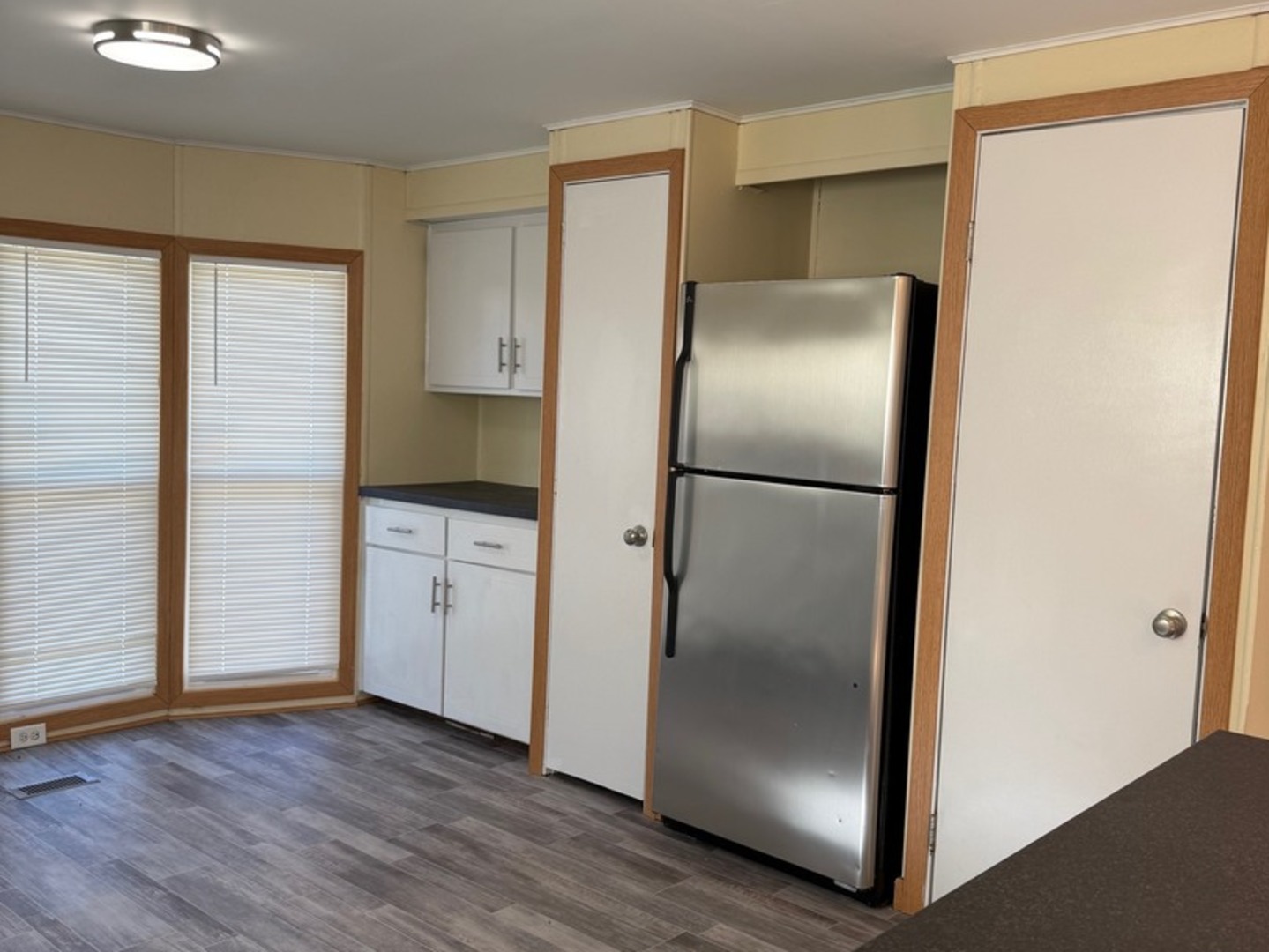 38455 North Sheridan Road, Unit 732 Beach Park, IL 60087 - Photo 8 of 25 a kitchen with a refrigerator and a stove top oven