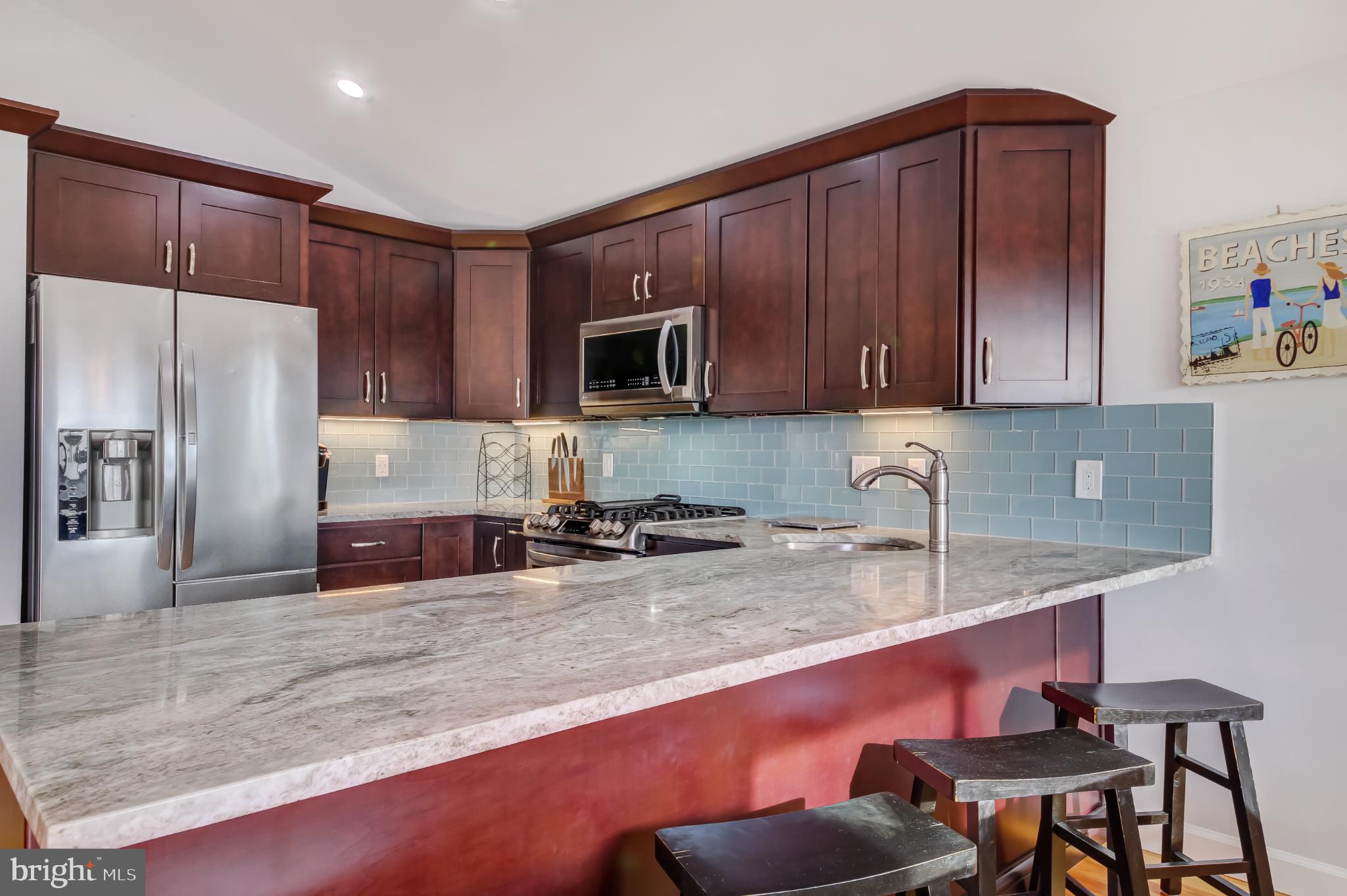 4 East 20th Street Barnegat Light, NJ 08006 - Photo 11 of 43 Modern kitchen with sleek finishes.