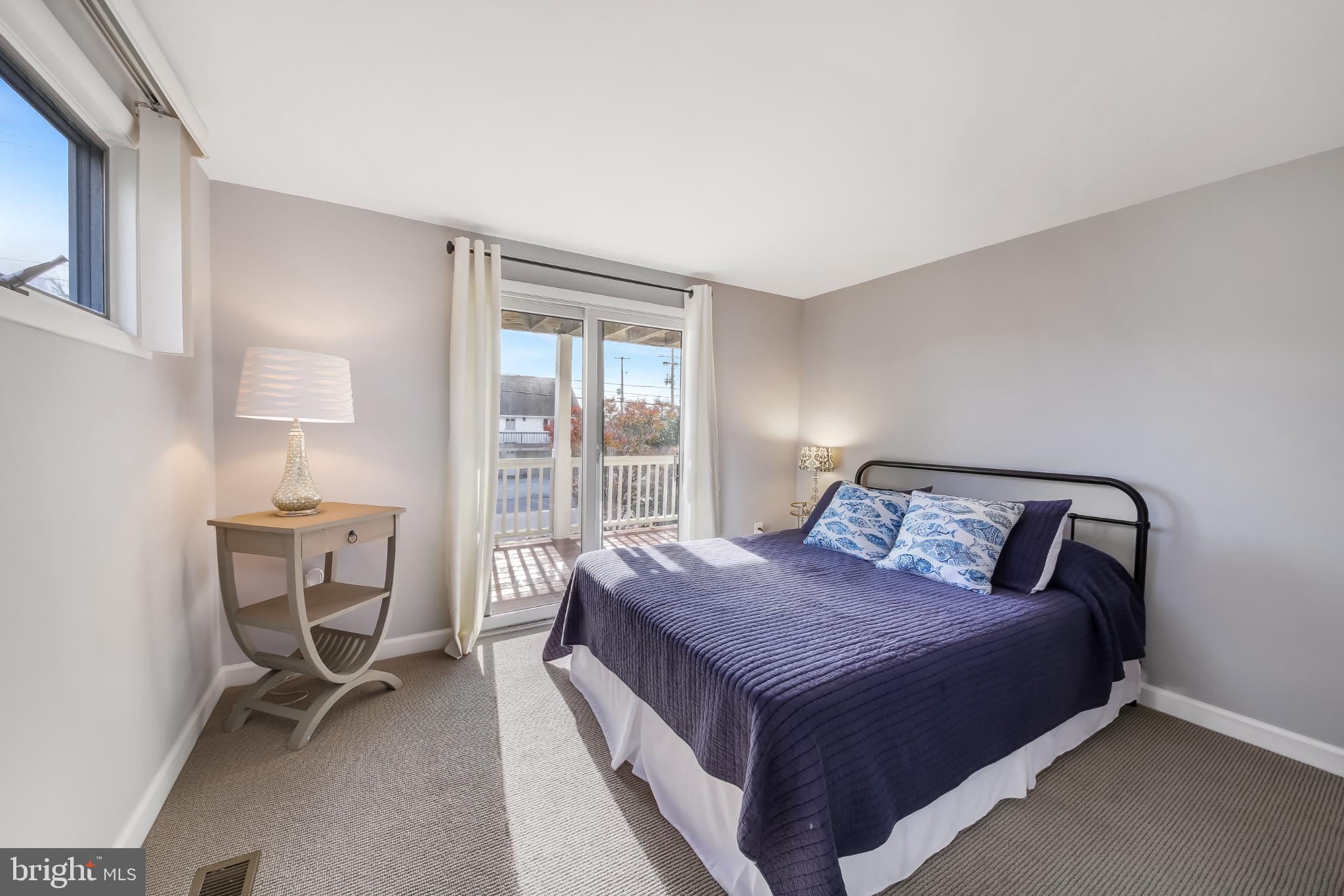 4 East 20th Street Barnegat Light, NJ 08006 - Photo 19 of 43 Serene bedroom with balcony access.
