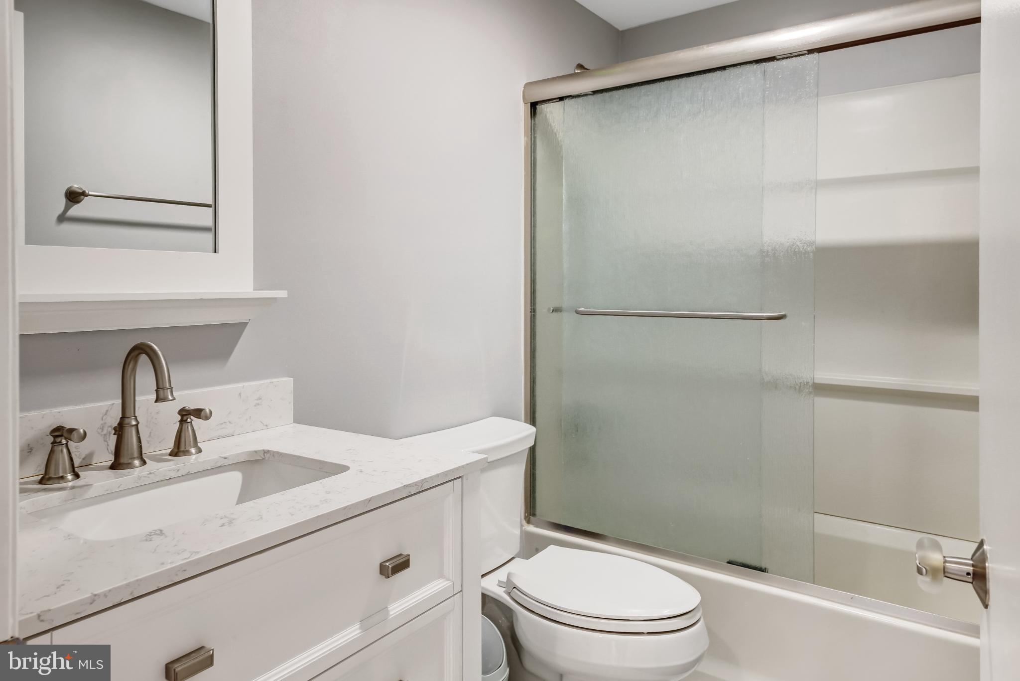 4 East 20th Street Barnegat Light, NJ 08006 - Photo 22 of 43 Modern bathroom with sleek finishes.