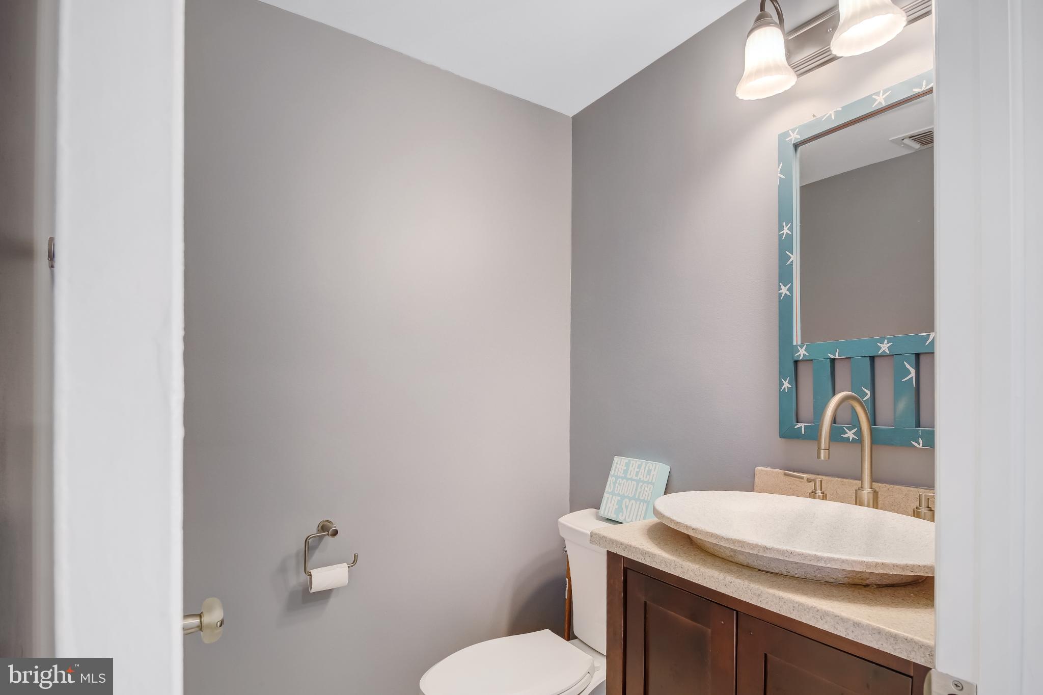 4 East 20th Street Barnegat Light, NJ 08006 - Photo 23 of 43 Chic coastal-inspired bathroom retreat.