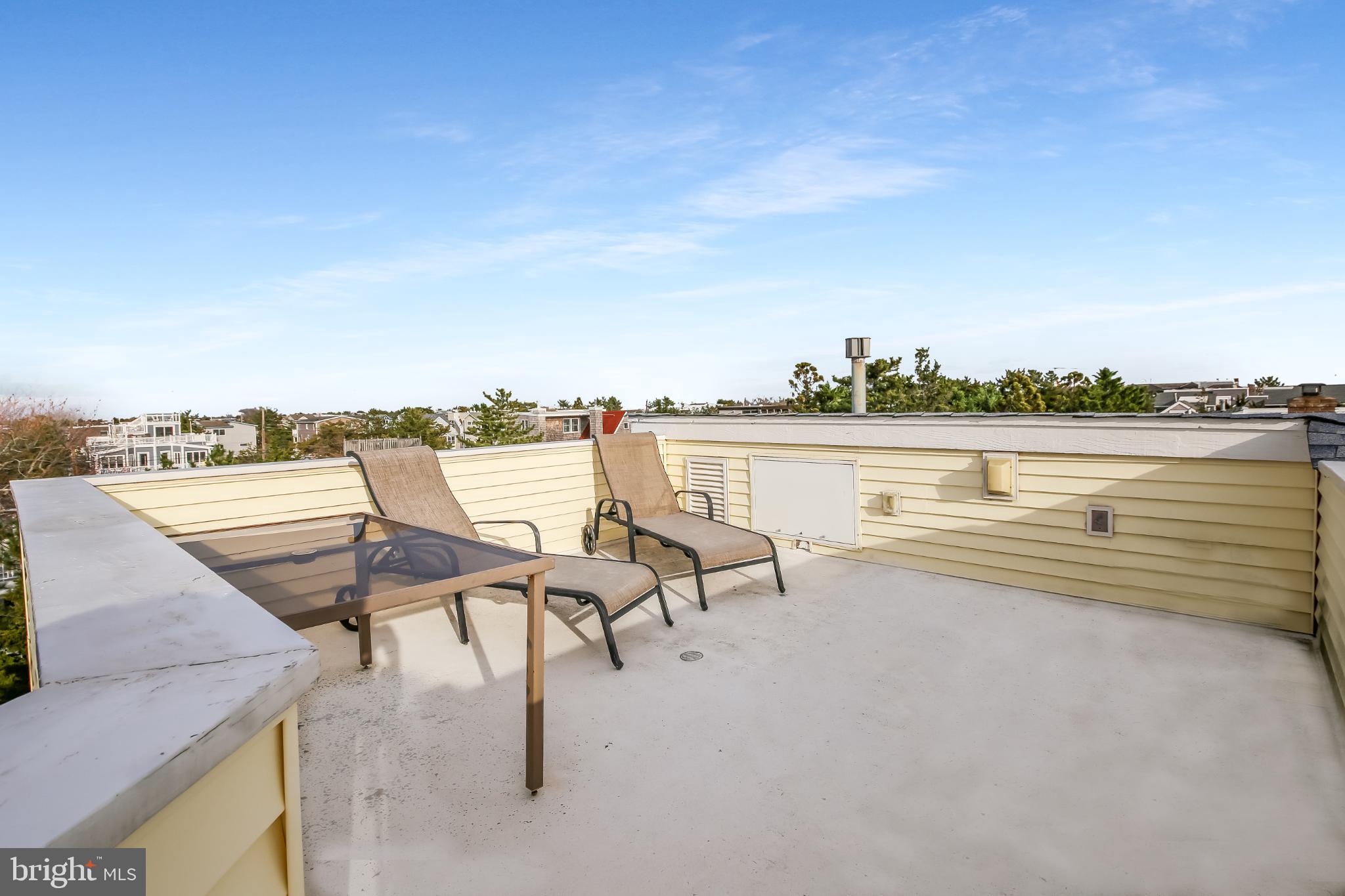 4 East 20th Street Barnegat Light, NJ 08006 - Photo 35 of 43 Sunny rooftop retreat with scenic views.