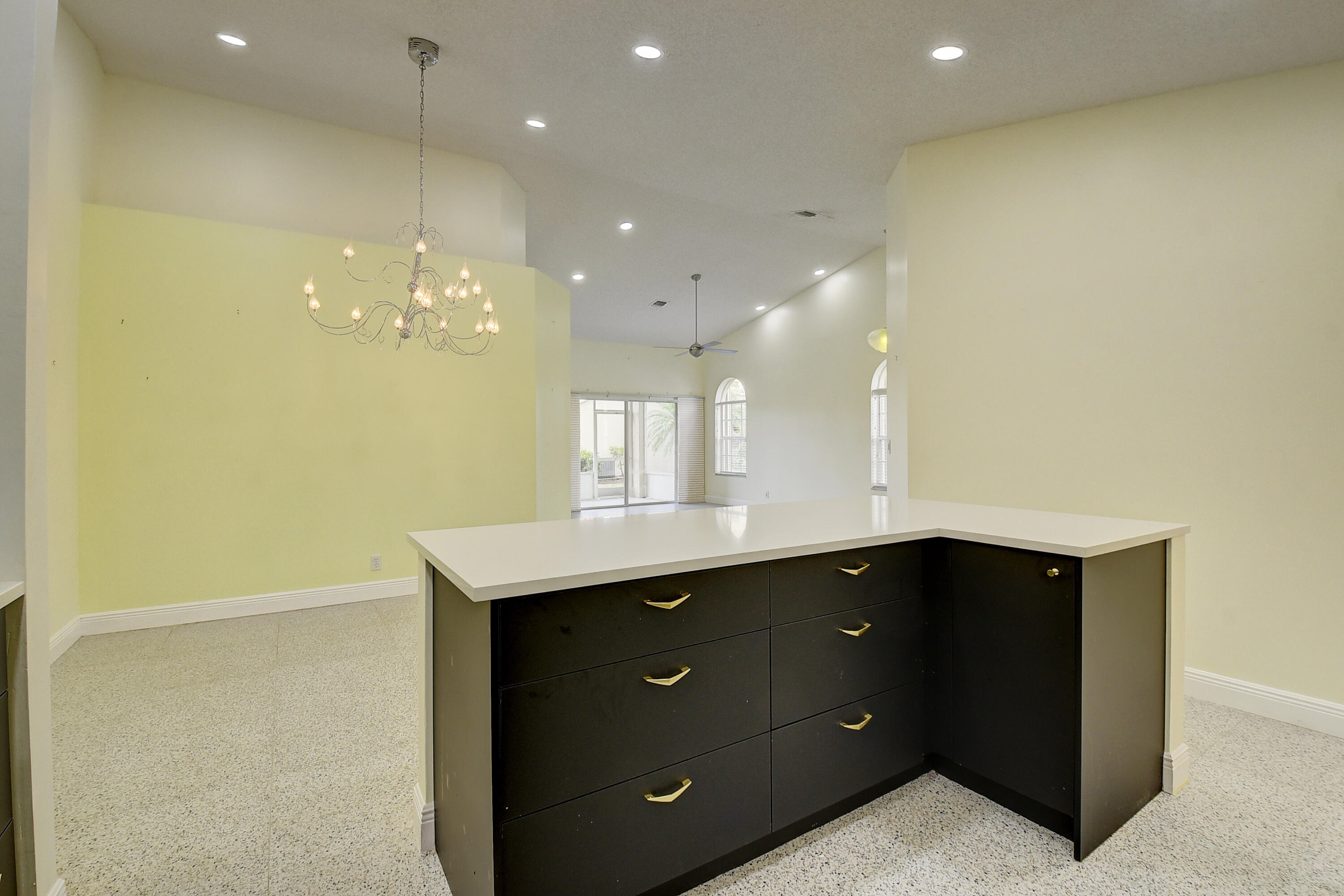 6210 Caladium Road Delray Beach, FL 33484 - Photo 16 of 59 a bathroom with a sink a light fixture and a mirror