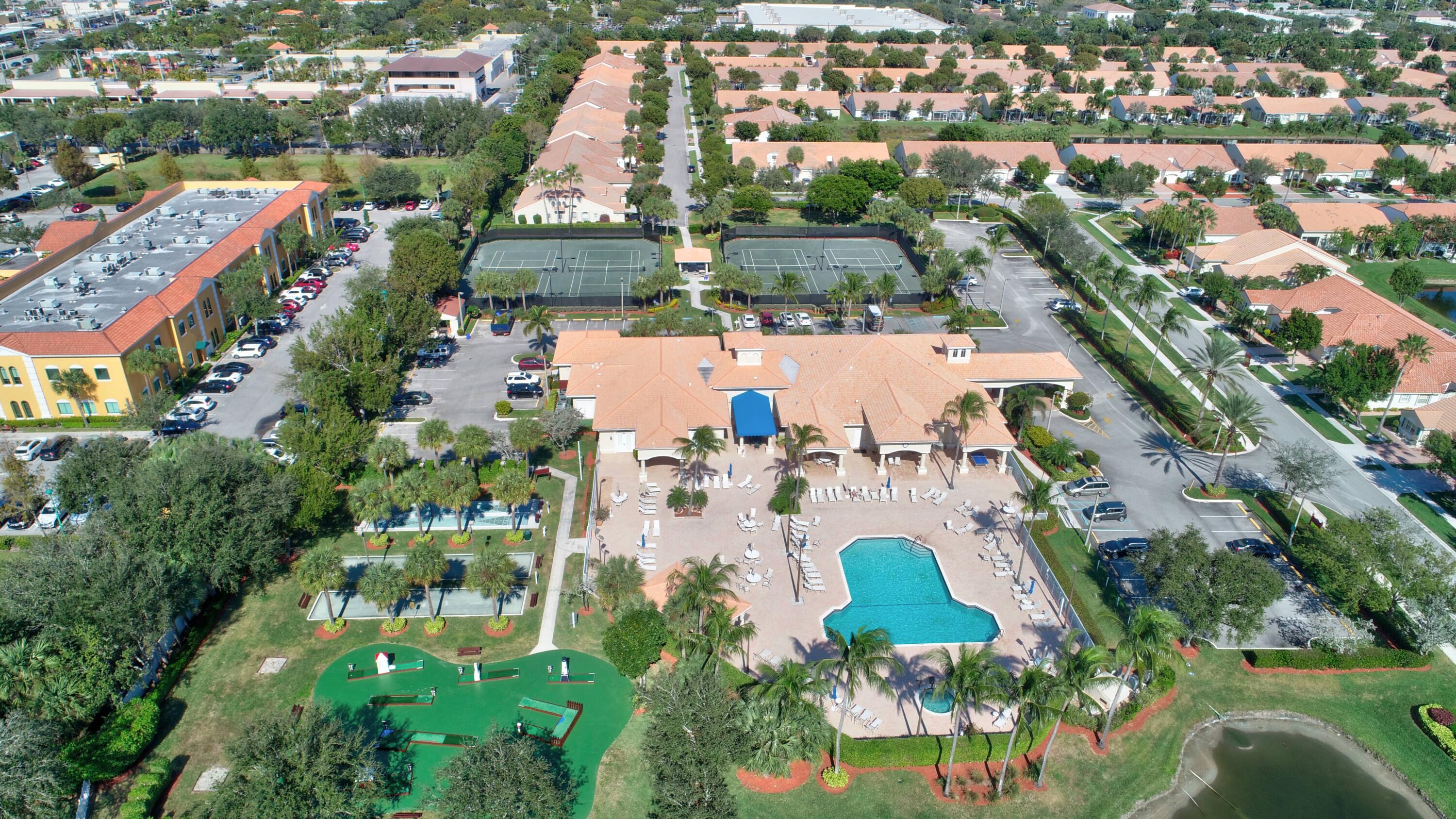 6210 Caladium Road Delray Beach, FL 33484 - Photo 48 of 59 an aerial view of residential houses with outdoor space
