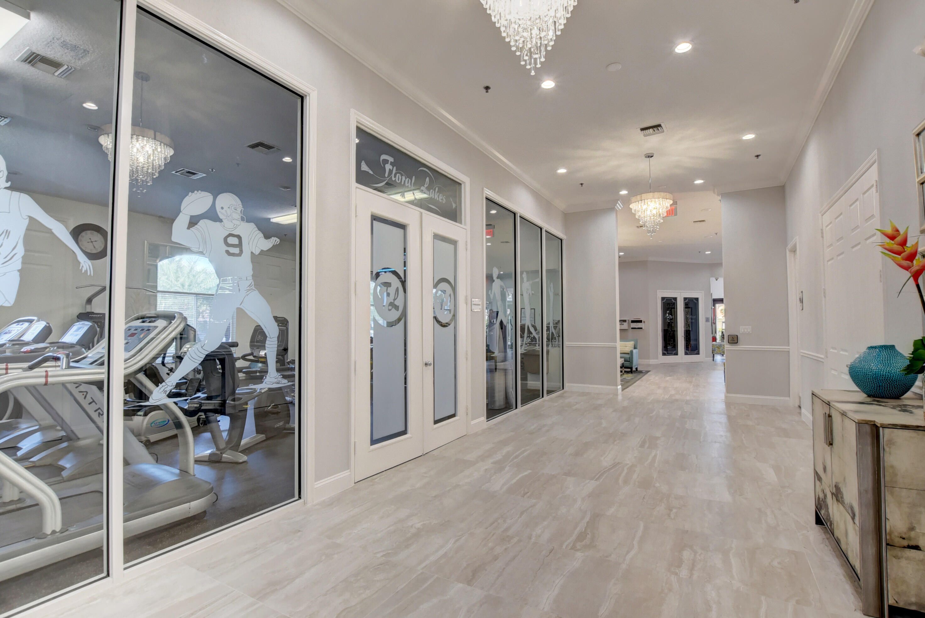 6210 Caladium Road Delray Beach, FL 33484 - Photo 53 of 59 a view of a hallway with wooden floor