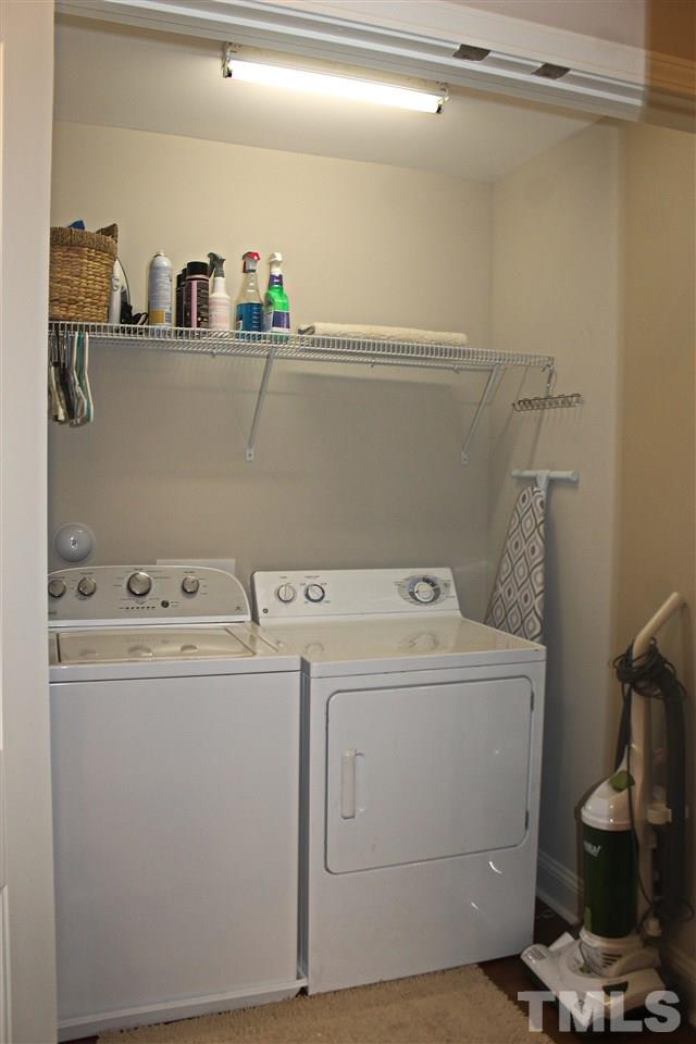 3902 Volkswalk Place Raleigh, NC 27610 - Photo 16 of 21 a utility room with dryer and washer
