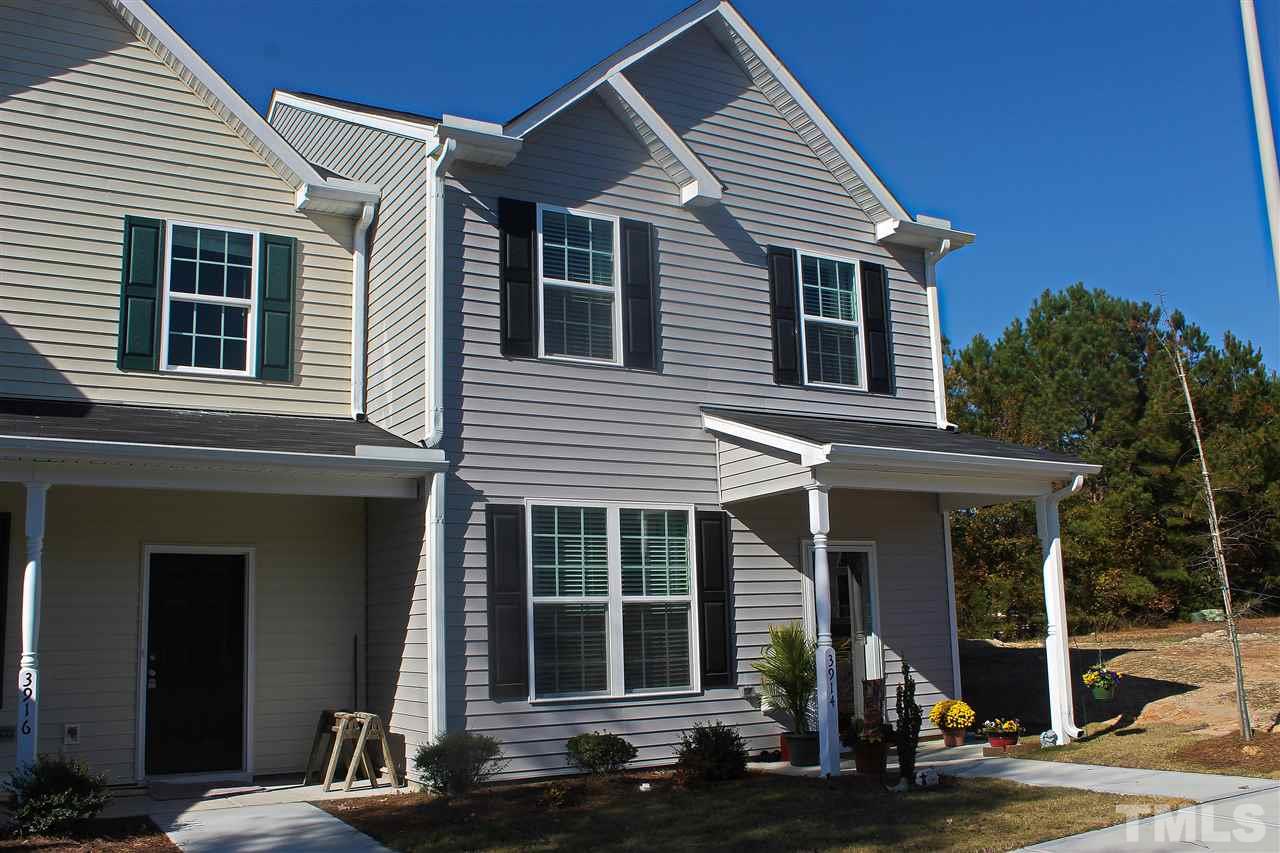3902 Volkswalk Place Raleigh, NC 27610 - Photo 3 of 21 a front view of a house with a porch