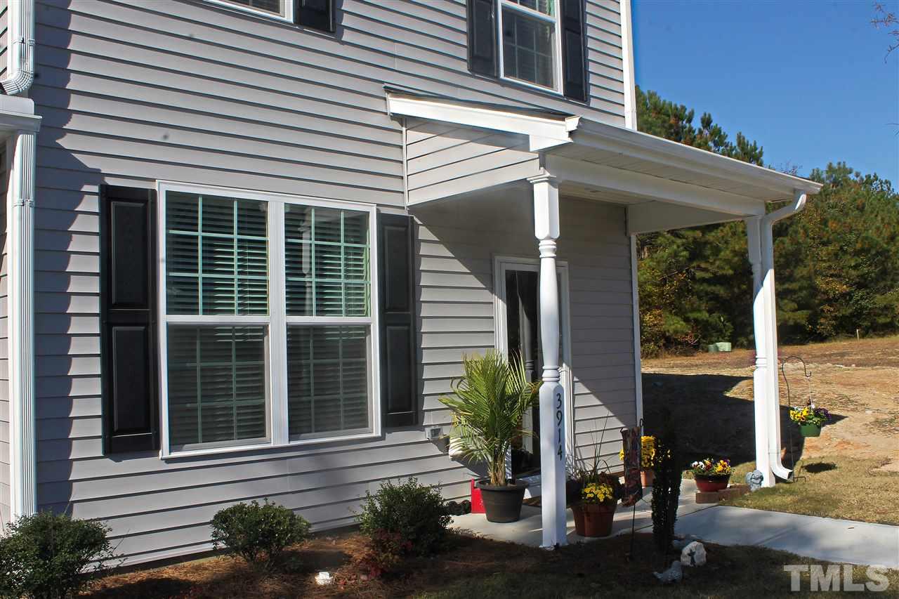 3902 Volkswalk Place Raleigh, NC 27610 - Photo 4 of 21 a view of a house with potted plants