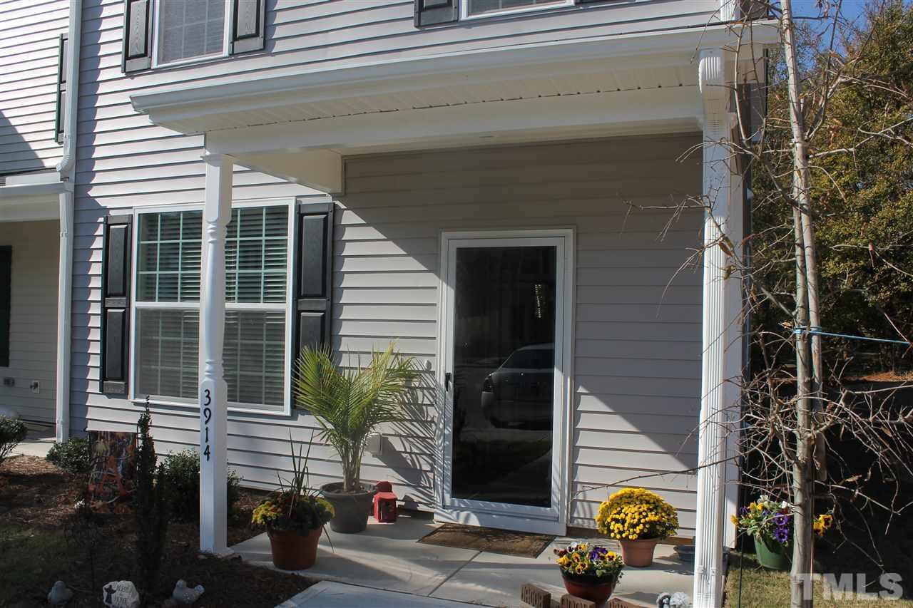 3902 Volkswalk Place Raleigh, NC 27610 - Photo 5 of 21 a front view of a house with a garden