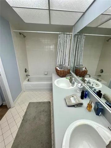 a bathroom with a tub and a shower