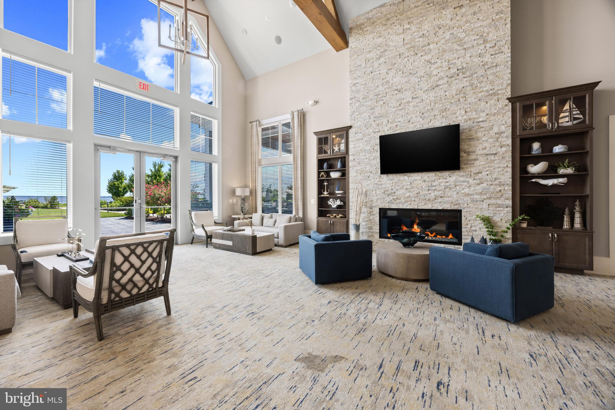 201 Switchgrass Way, Unit 34 Chester, MD 21619 - Photo 31 of 41 Relax by the Fireplace