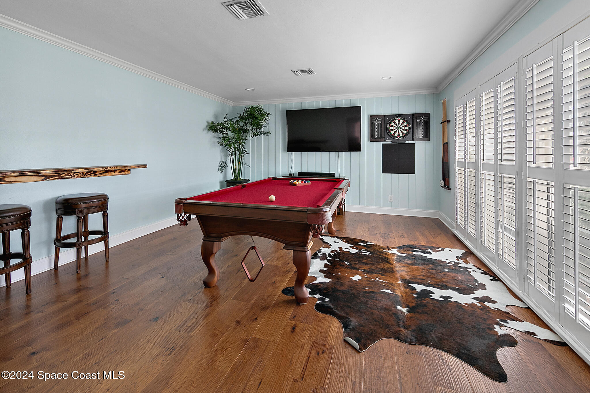 200 Melbourne Avenue Indialantic, FL 32903 - Photo 11 of 60 a view of a room with furniture and wooden floor