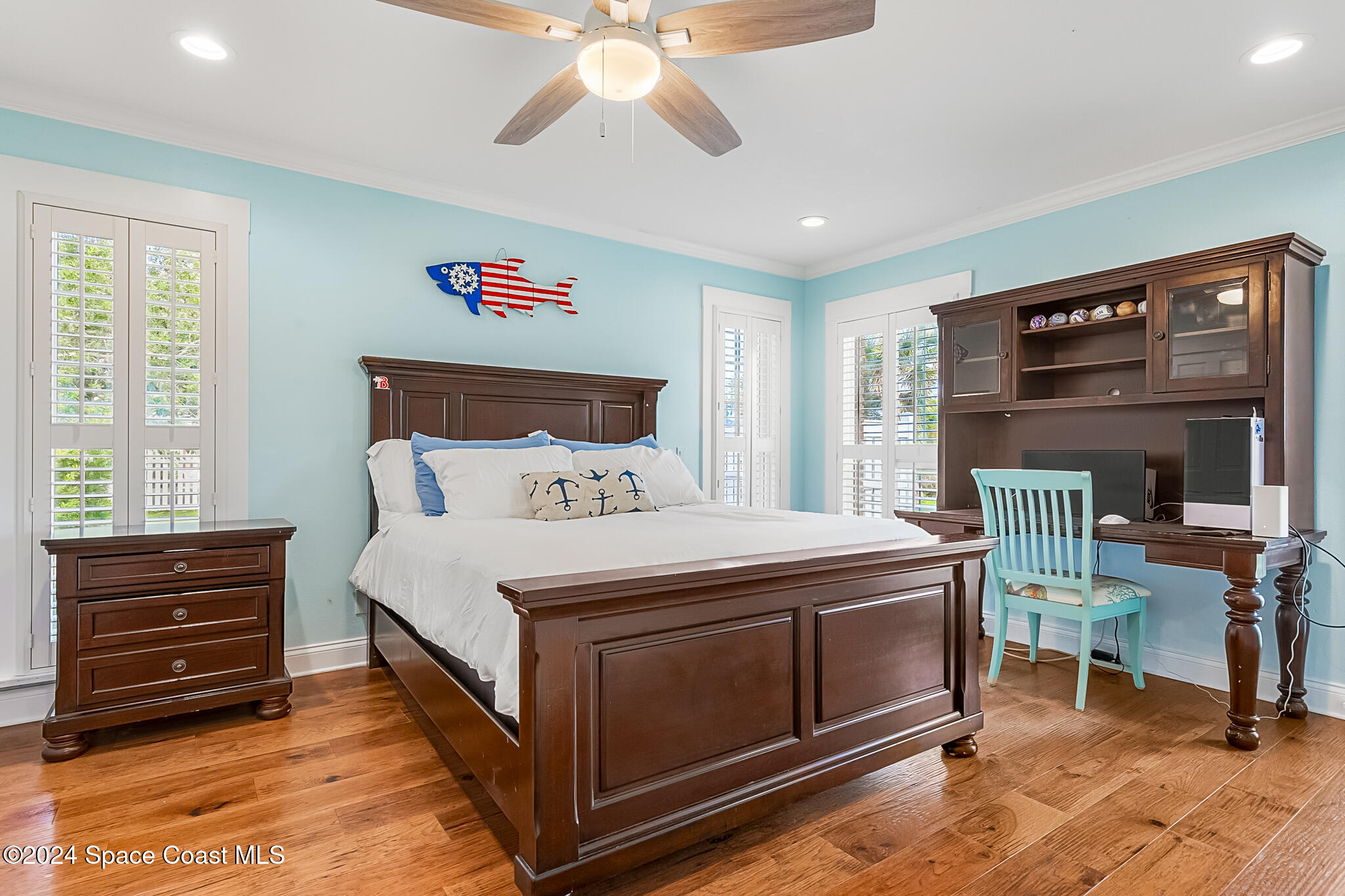 200 Melbourne Avenue Indialantic, FL 32903 - Photo 30 of 60 a bed room with a bed and a television