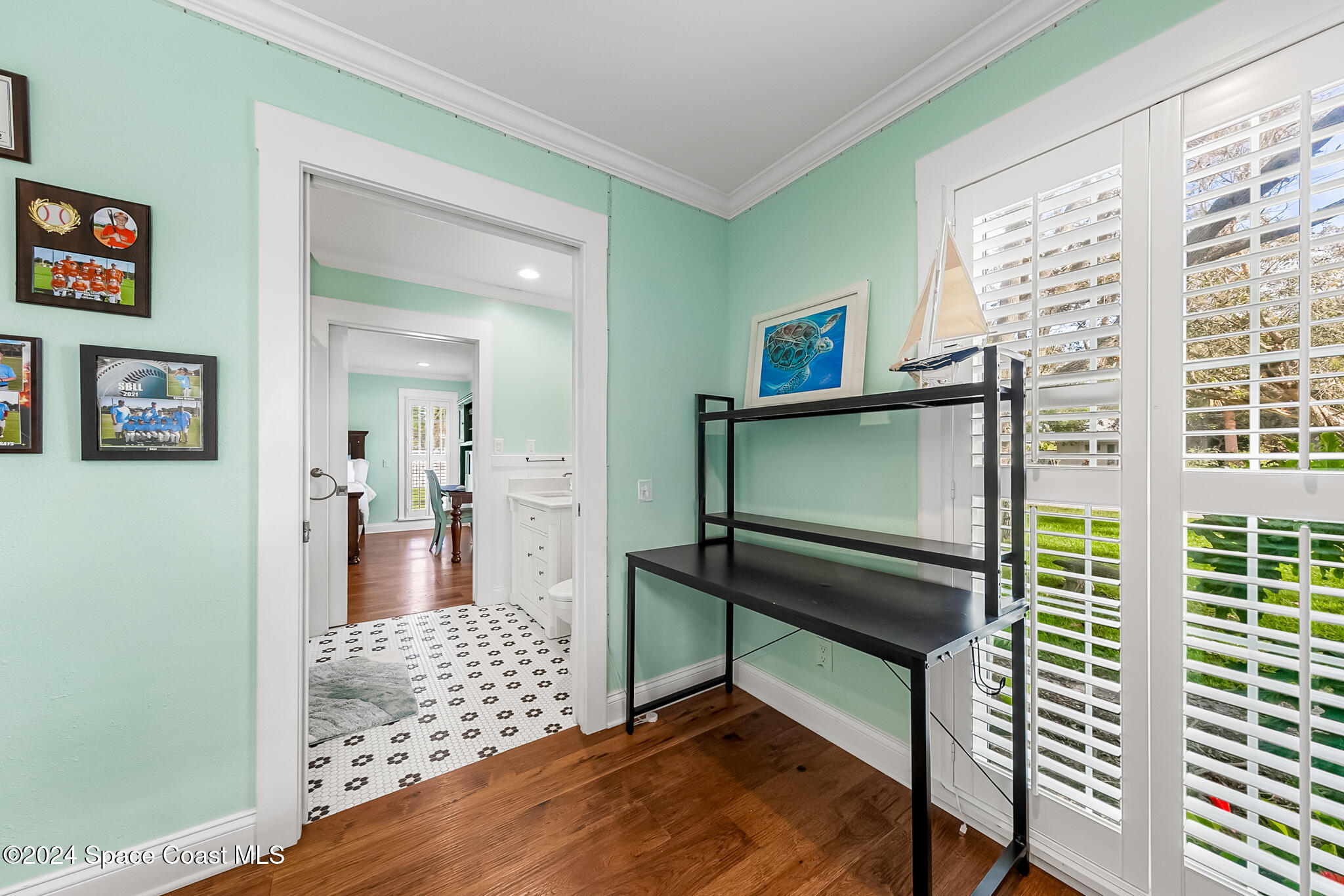 200 Melbourne Avenue Indialantic, FL 32903 - Photo 32 of 60 a living room with furniture and a wooden floor