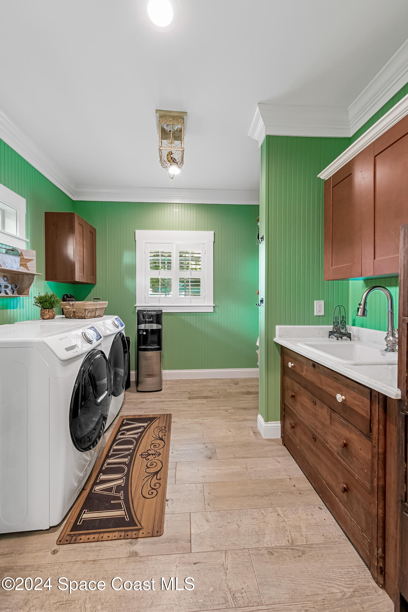 200 Melbourne Avenue Indialantic, FL 32903 - Photo 38 of 60 a bedroom with a bed and a dresser