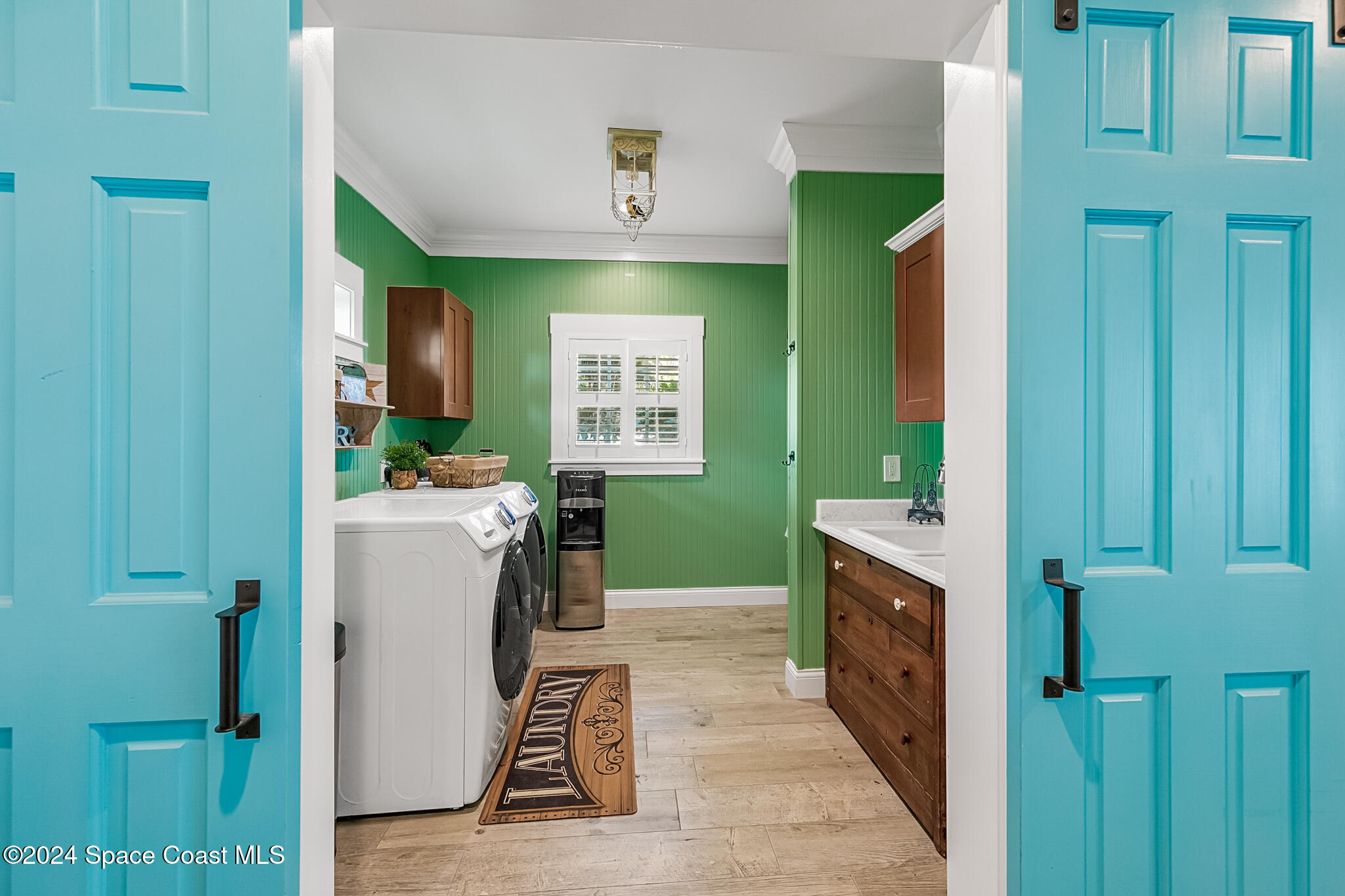 200 Melbourne Avenue Indialantic, FL 32903 - Photo 39 of 60 a room with a washer and dryer