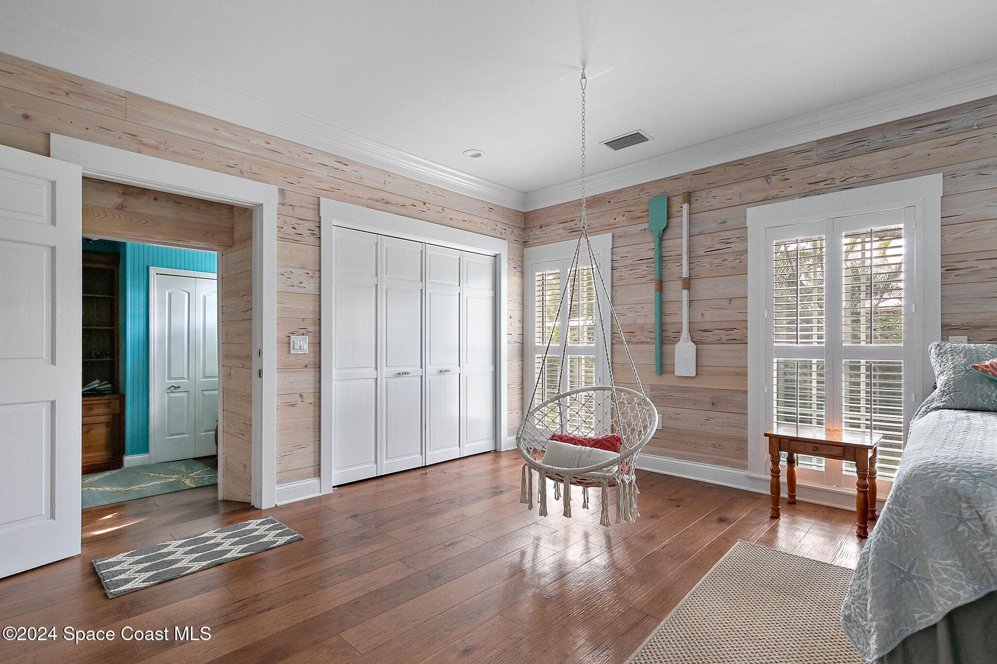 200 Melbourne Avenue Indialantic, FL 32903 - Photo 40 of 60 a living room with furniture and a large window