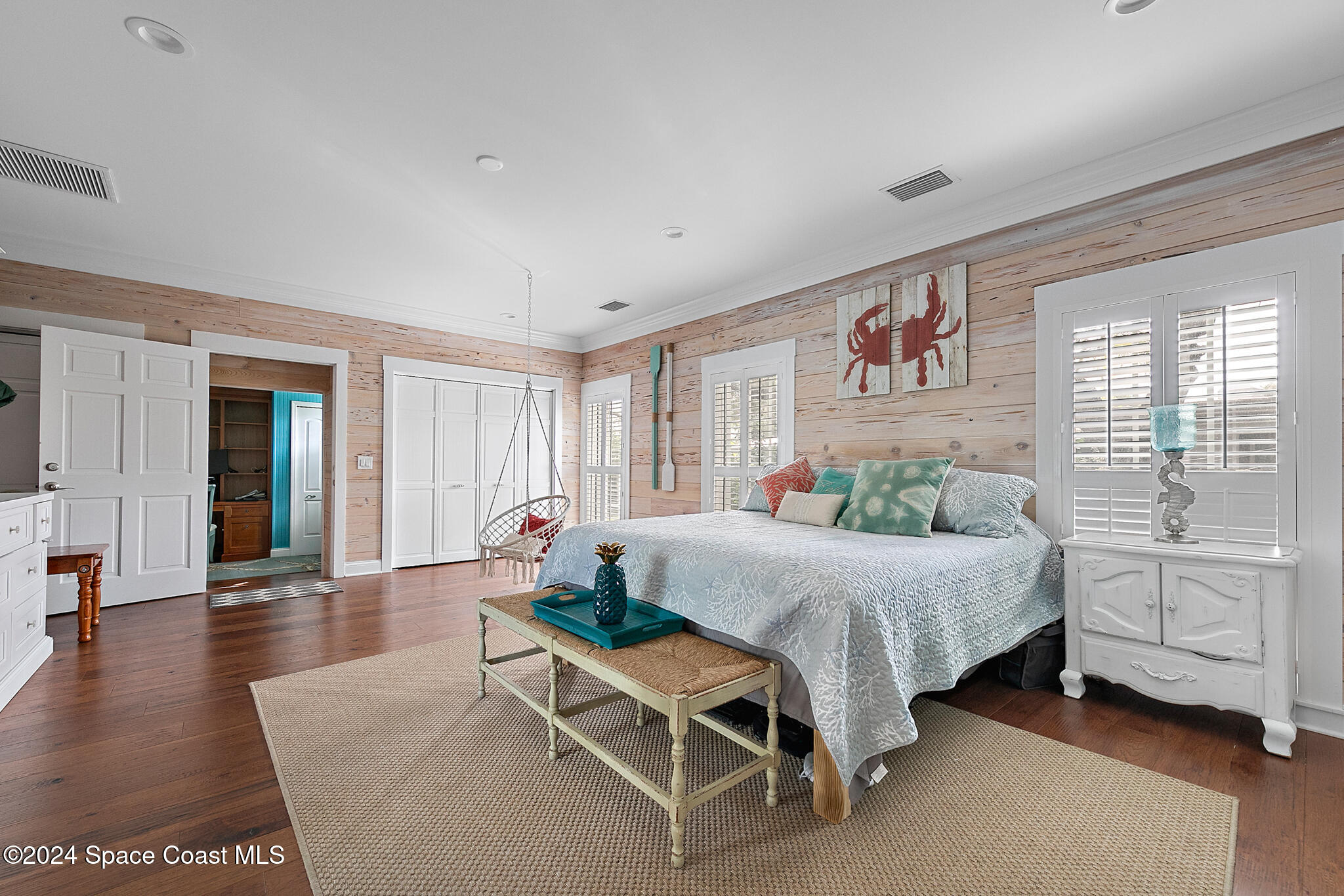200 Melbourne Avenue Indialantic, FL 32903 - Photo 42 of 60 a living room with furniture and wooden floor