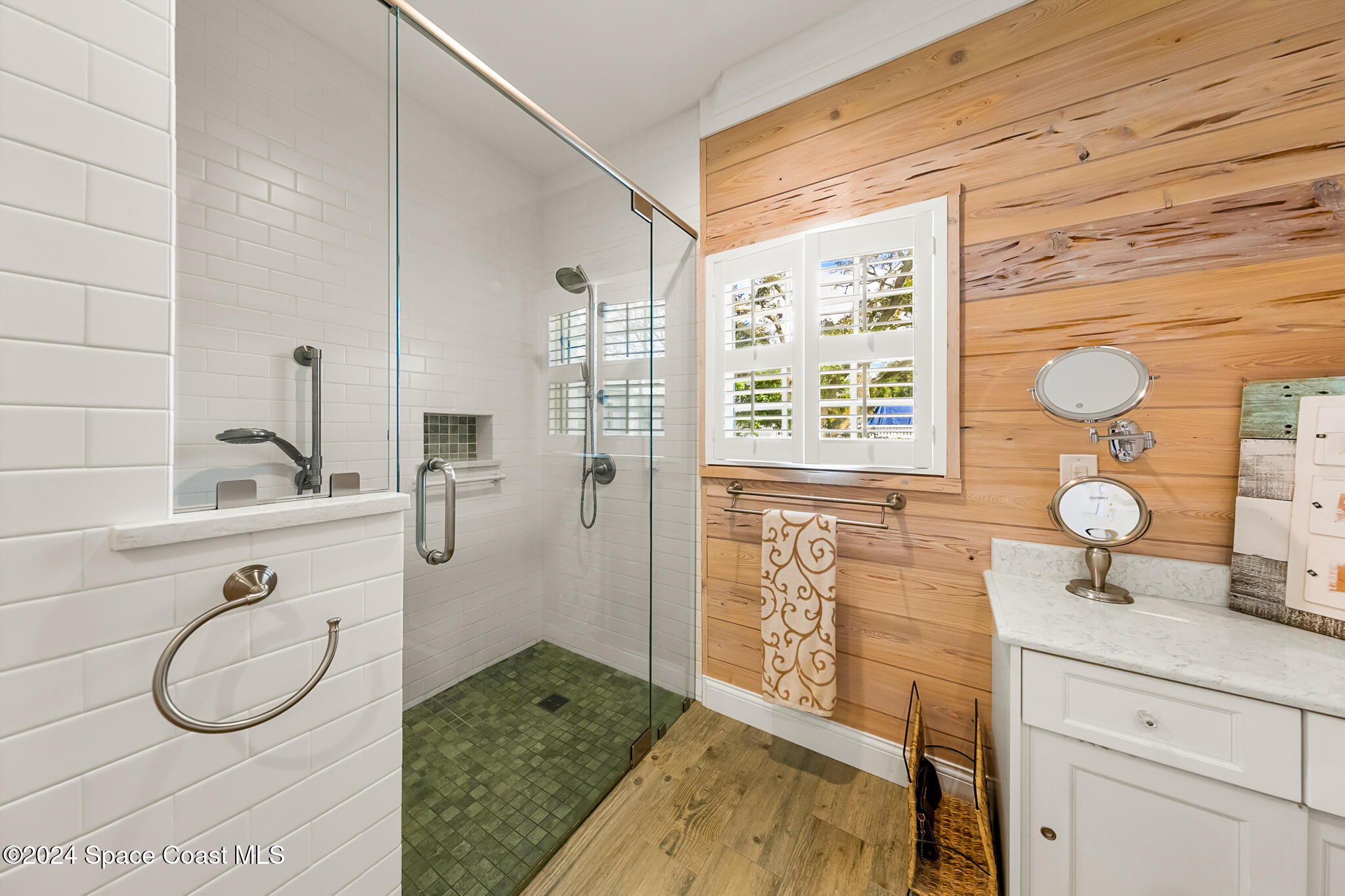 200 Melbourne Avenue Indialantic, FL 32903 - Photo 45 of 60 a bathroom with a granite countertop sink and a mirror