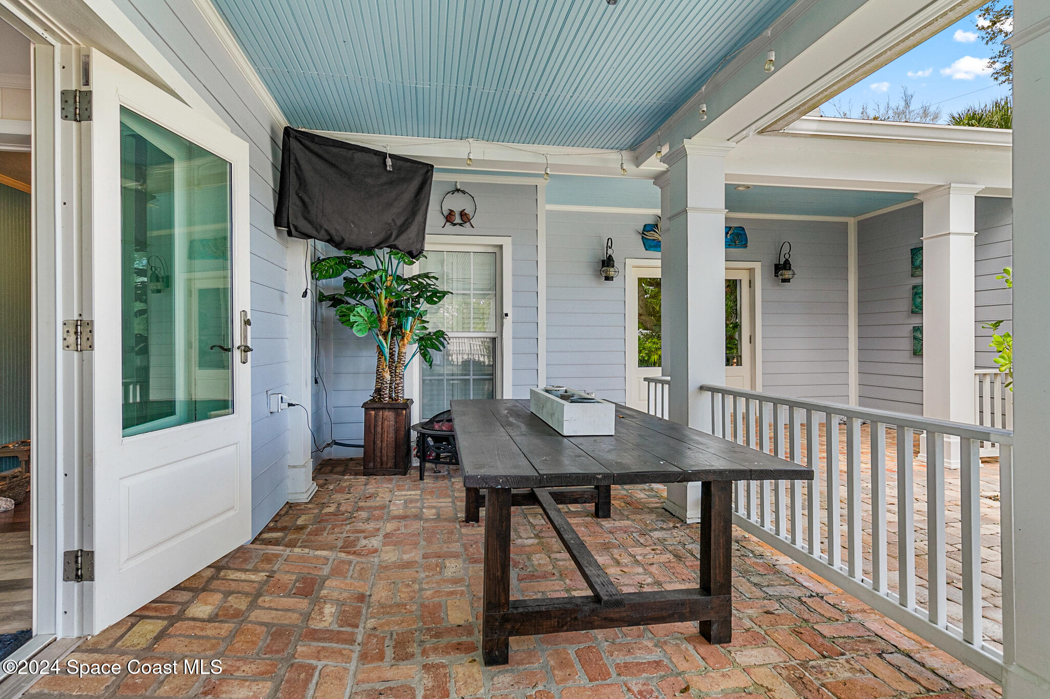 200 Melbourne Avenue Indialantic, FL 32903 - Photo 48 of 60 a view of a house with backyard and sitting area