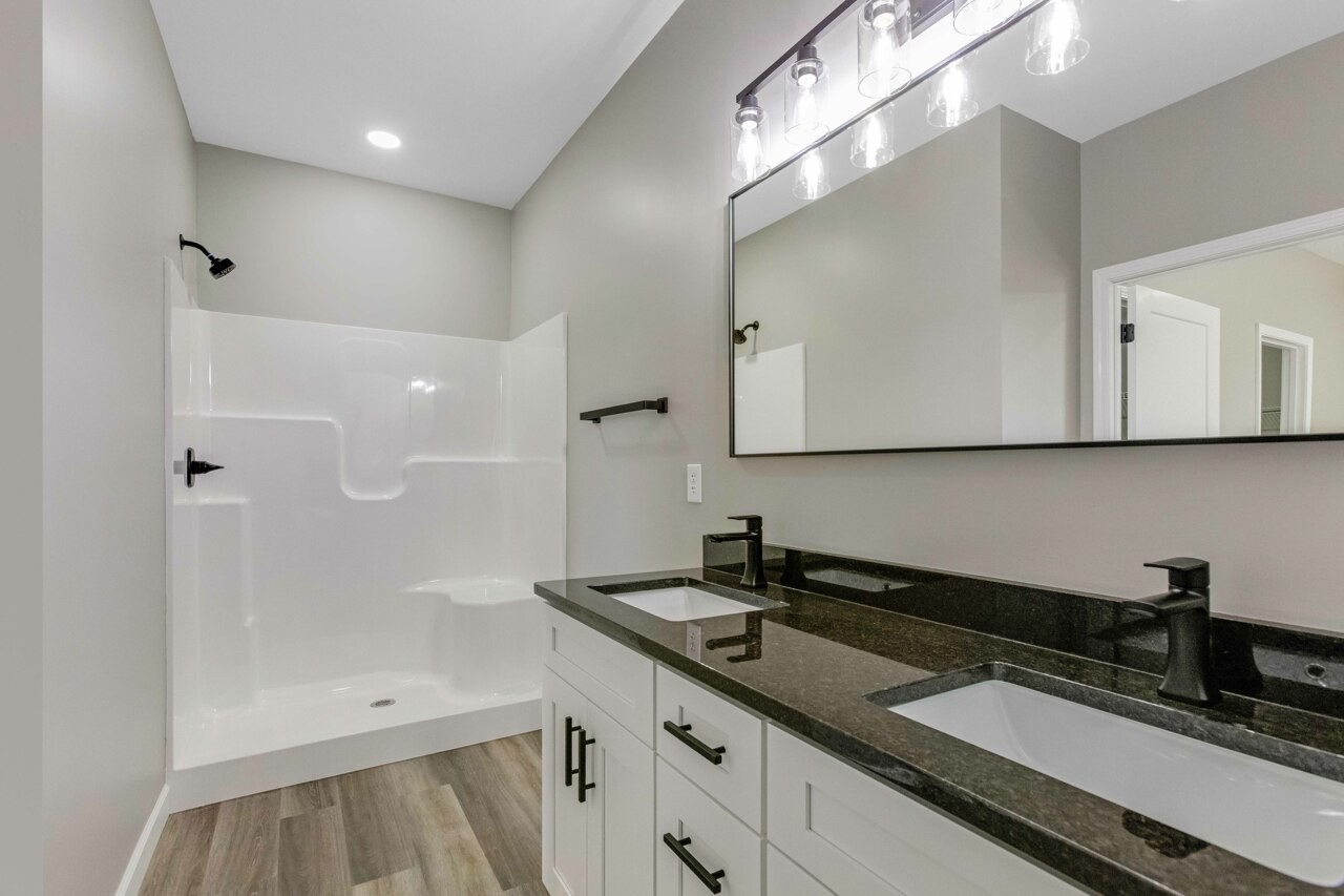 146 Carl Williams Road Crofton, KY 42217 - Photo 15 of 30 a bathroom with a sink and a mirror