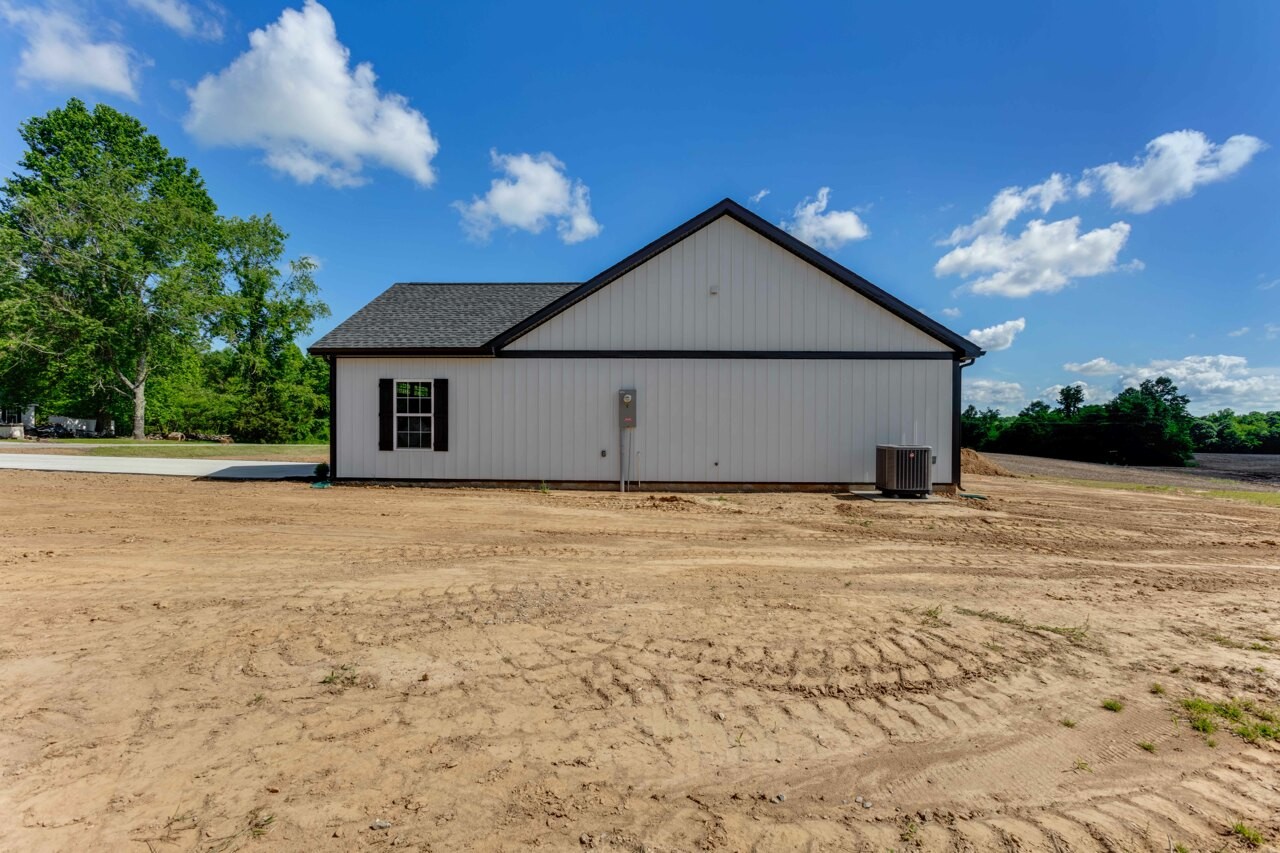 146 Carl Williams Road Crofton, KY 42217 - Photo 3 of 30 a view of a house with a backyard